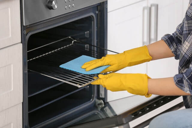 cleaning an oven