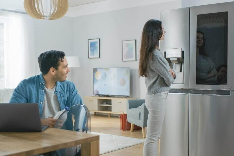 family using smart fridge 1